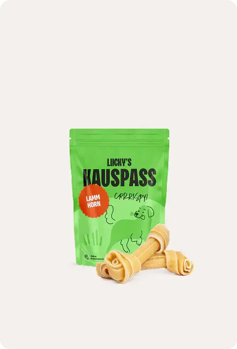 Natürliche Kauartikel für Hunde in grüner Verpackung mit Hundeknochen Snacks.