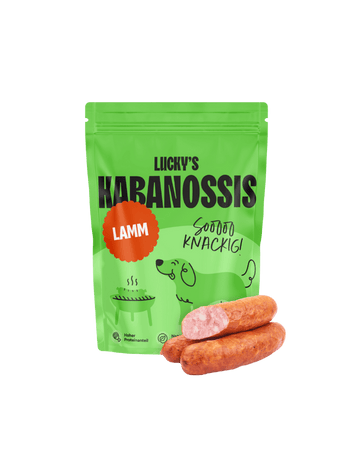 Licky's Kabanossis lamb dog treats in green packaging with sausages on a white background.